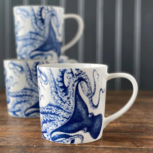 Mugs with blue octopus design on white porcelain