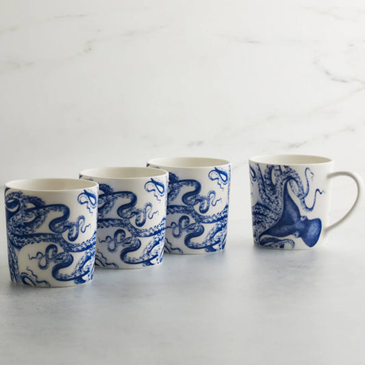 Four mugs with blue octopus designs on a white porcelain